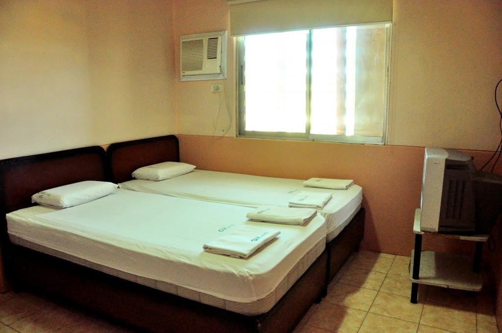 Gv Hotel - Camiguin Мамбахао Номер фото