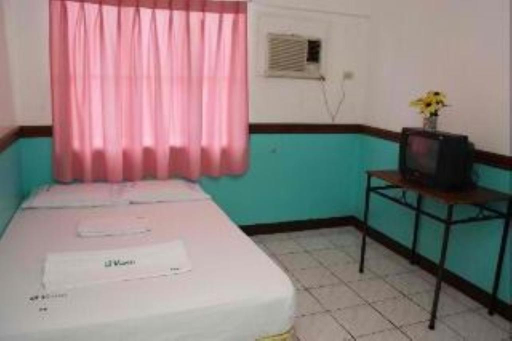 Gv Hotel - Camiguin Мамбахао Номер фото